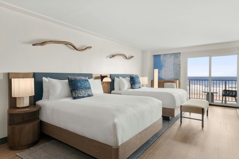 Double Queen Oceanfront room with a Bench