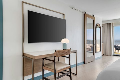 Tv and desk area of Oceanfront King Room
