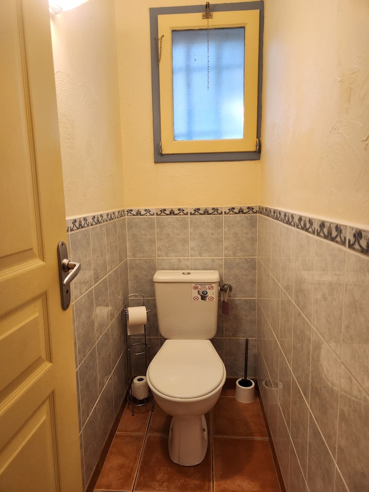 Raised toilet seat