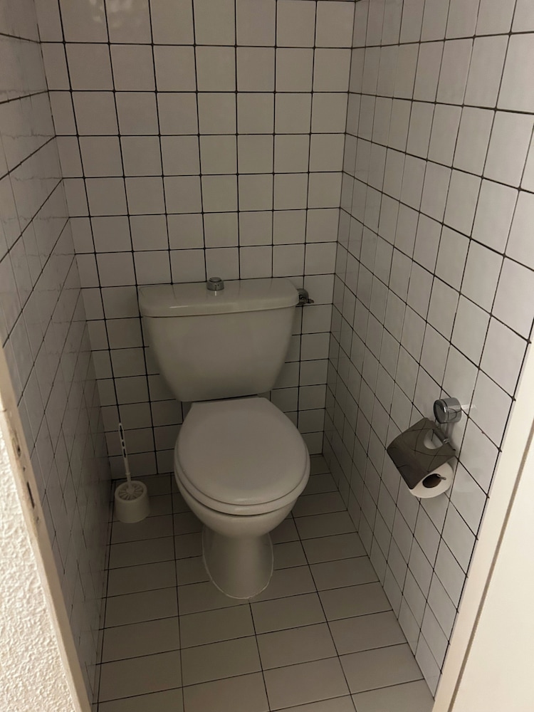 Raised toilet seat