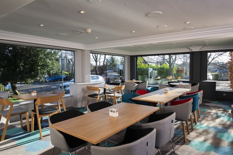 Meet and eat in our bright and colourful lounge