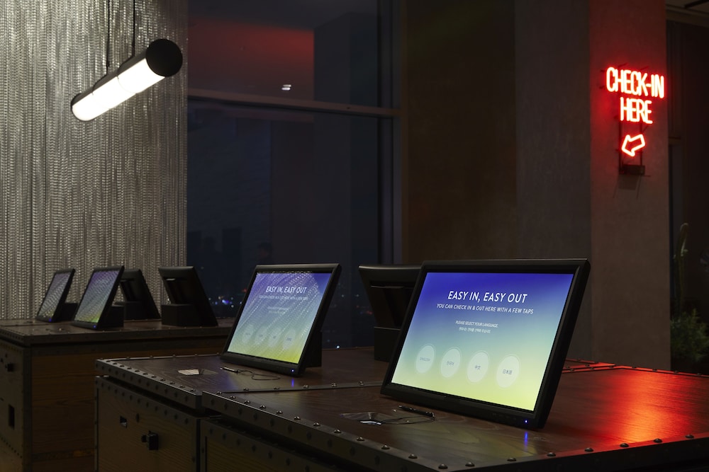 Check-in/check-out kiosk