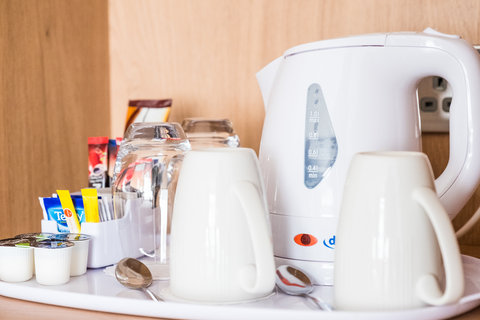 Enjoy tea and coffee in your hotel room