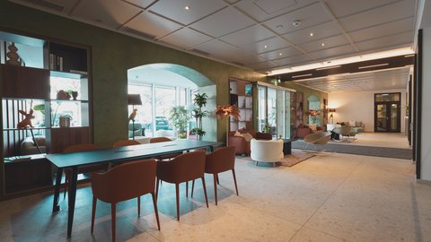Meeting table in warm, inviting hotel lobby