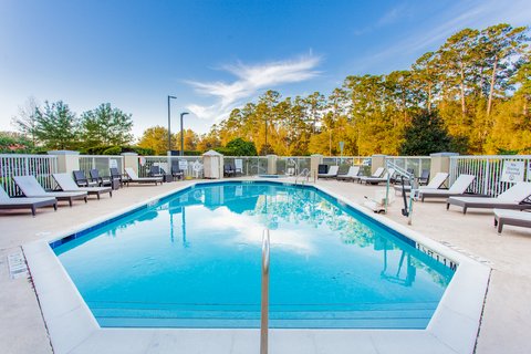 Take a relaxing dip in our outdoor pool and enjoy the Florida sun.