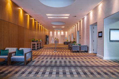 Connect with guests in the spacious pre-function area.