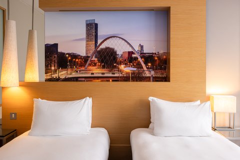 Enjoy a cosy Classic Twin room with natural lighting