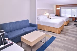 thumbnail: Two queen suite with 40 in. HDTV and in-room safe.