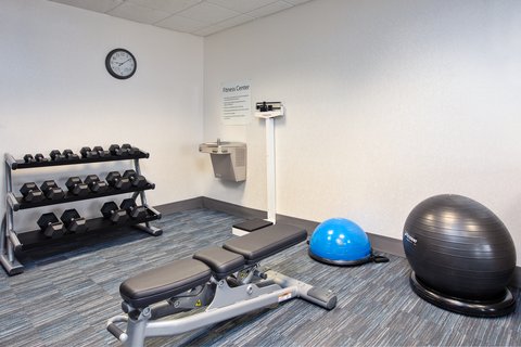 Modern Fitness Room with Extensive Options.