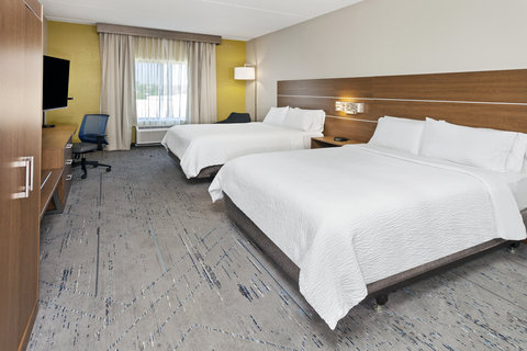 Two queen beds for a perfect shared stay.