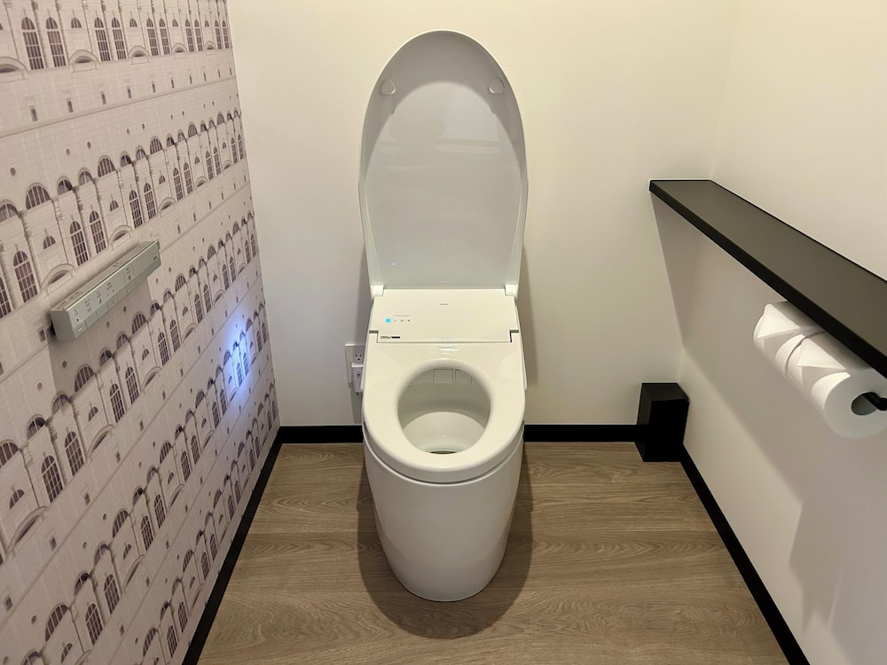 Raised toilet seat