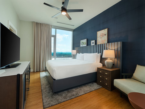 Condo bedroom with king bed