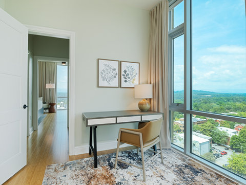 Condo work spaces with floor to ceiling windows
