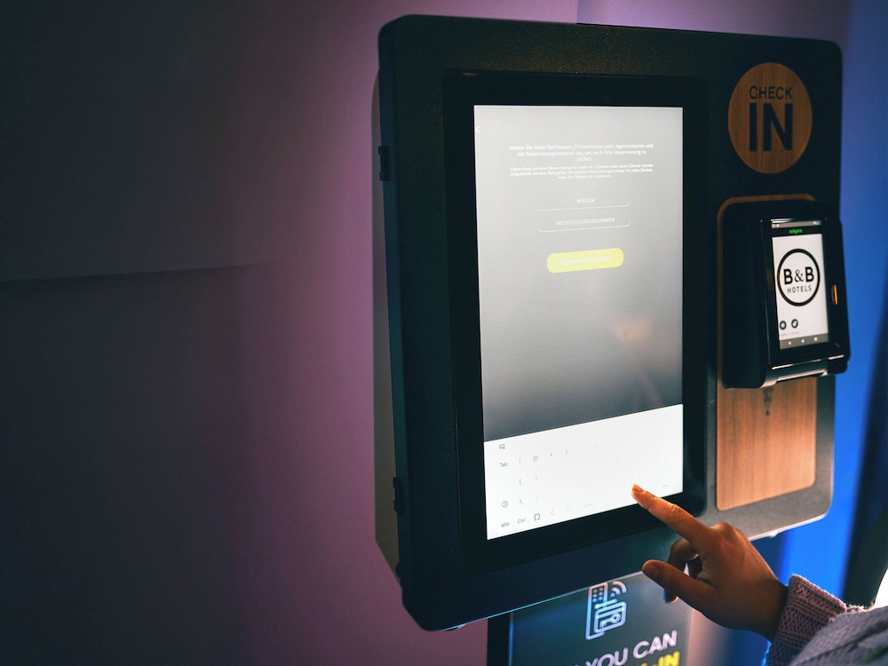Check-in/check-out kiosk
