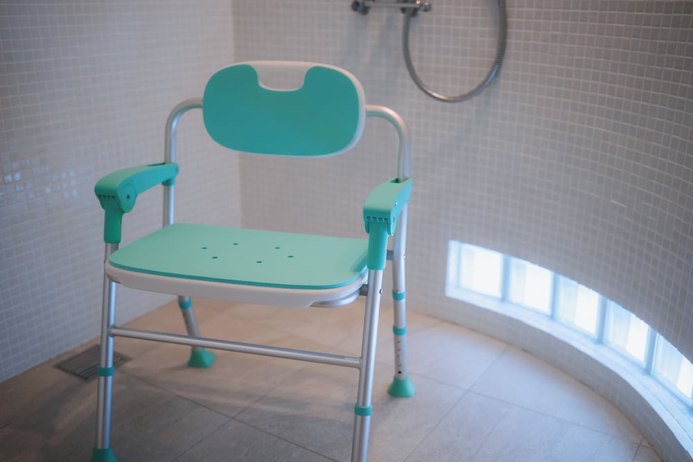 Portable shower seat