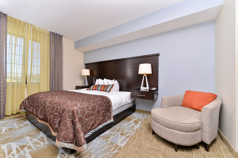One bedroom executive suite with a kind bed.
