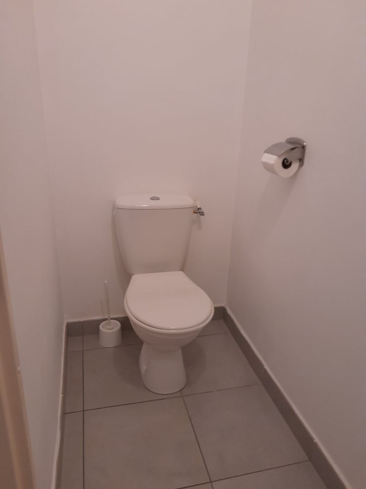 Raised toilet seat