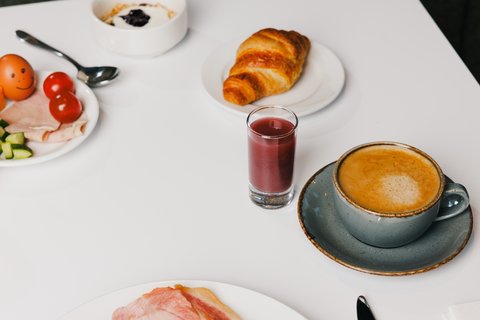 A coffee or fresh juice to go with breakfast