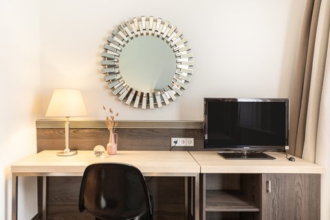 Practical workspace with sockets and highspeed Wi-Fi for work