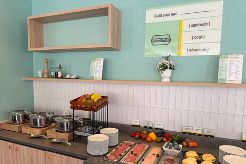 Fresh fruit and cold cuts await at our breakfast buffet