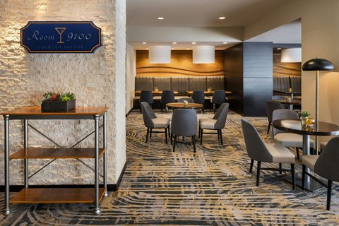 Relax in the inviting Room 9100 lounge