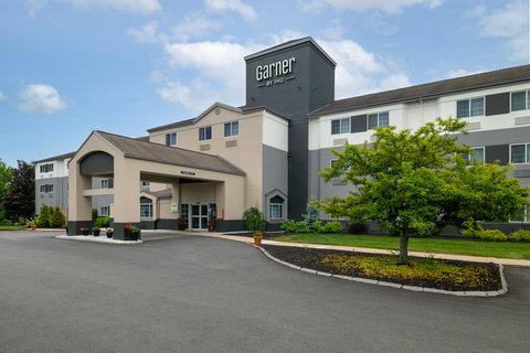 Exterior front of hotel in the day