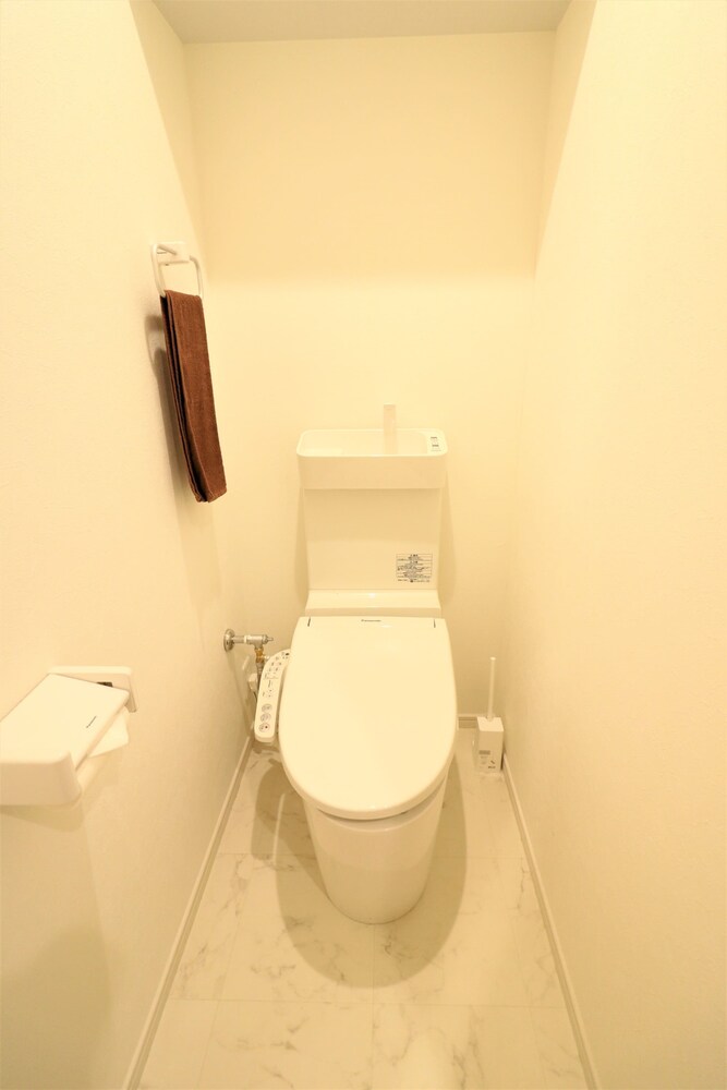 Raised toilet seat