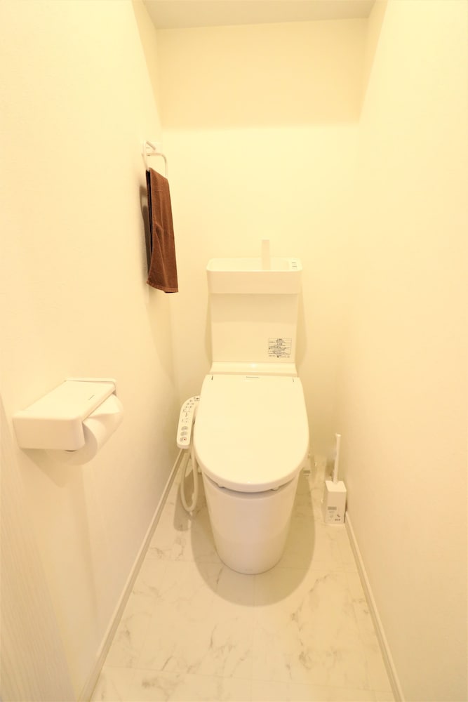 Raised toilet seat