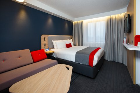 Comfortable and well-planned room for a seamless guest experience.