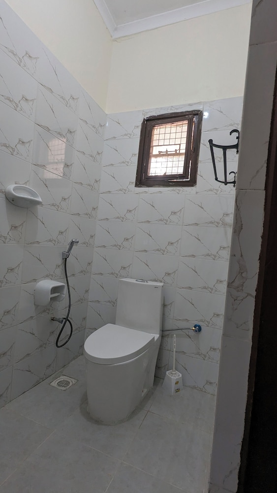 Raised toilet seat