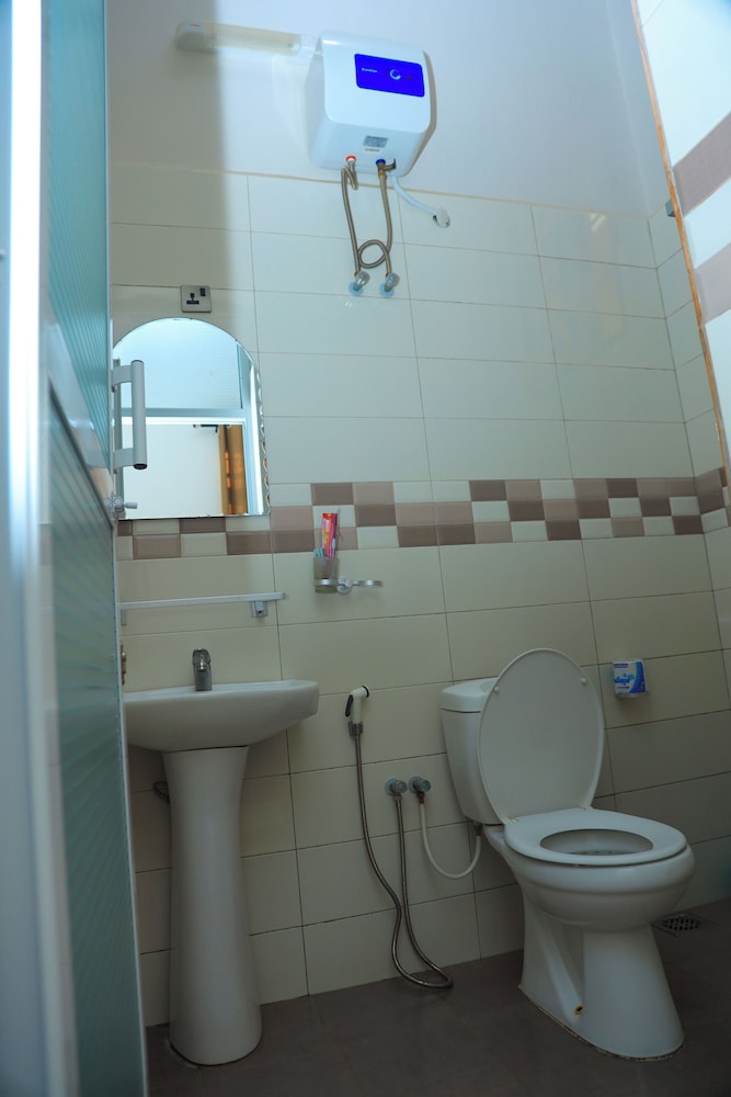 Raised toilet seat