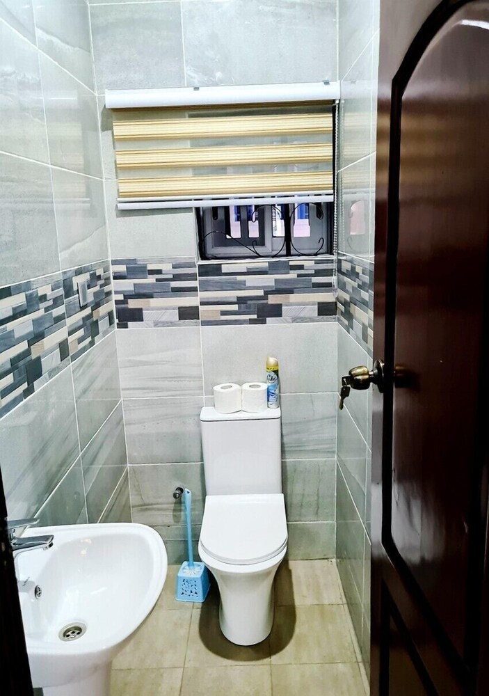 Raised toilet seat