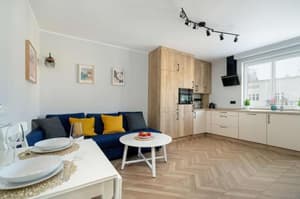 Elegancki i Przytulny Apartament z Balkonem w Poznaniu by Noclegi Renters
