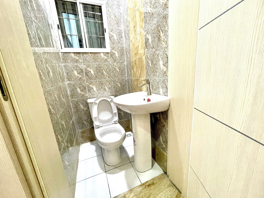 Raised toilet seat