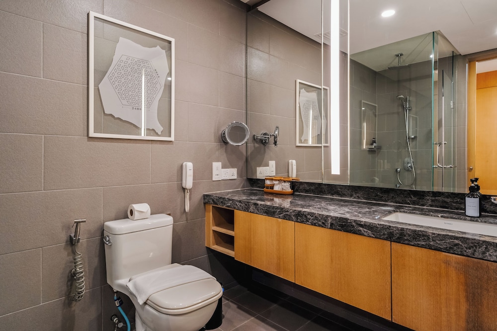Raised toilet seat