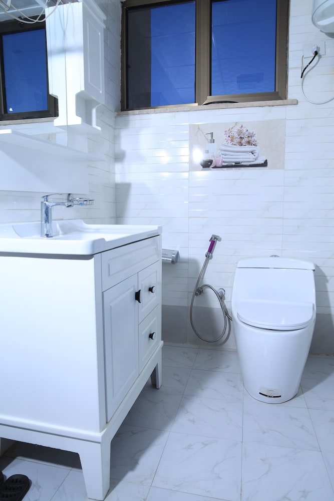 Raised toilet seat