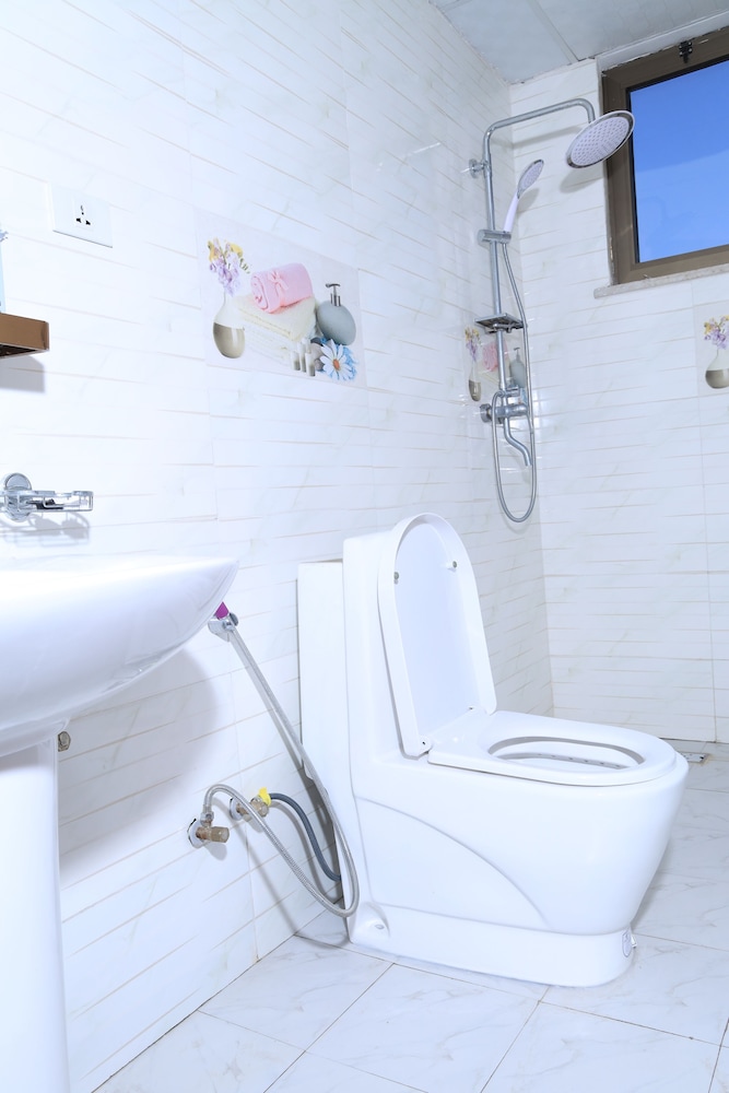 Raised toilet seat