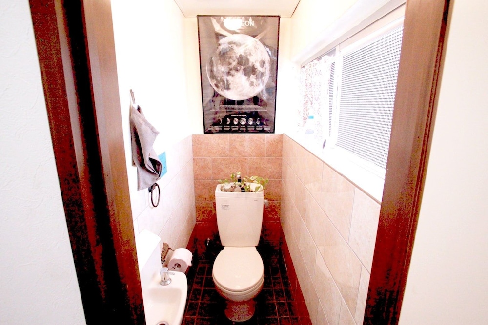 Raised toilet seat