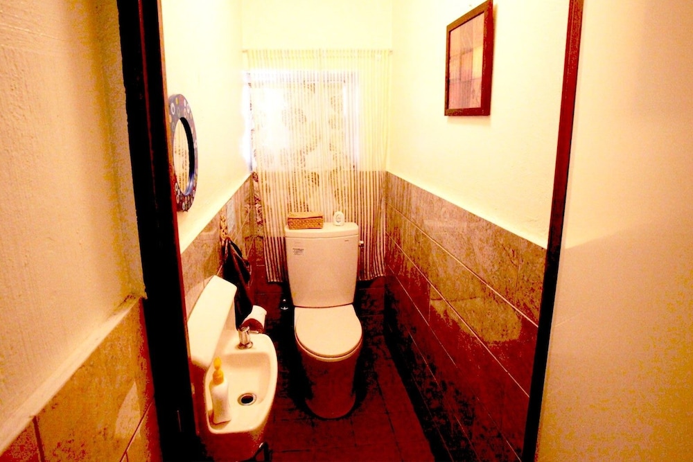 Raised toilet seat