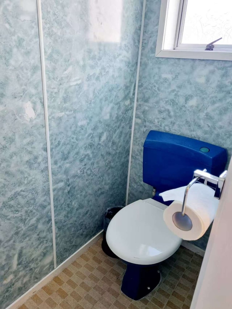 Raised toilet seat