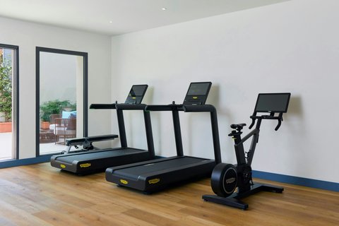 Cardio equipment in the hotel gym.