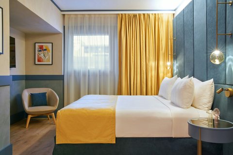 Superior Room interior with warm accents.